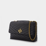 Kira Chevron Convertible Shoulder Bag in black leather