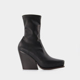 Cowboy Boots in Black Synthetic Leather