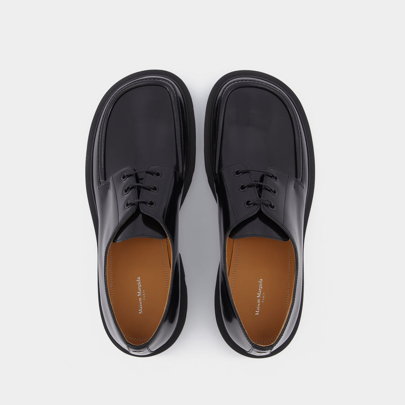 Derbies in Black Leather