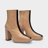 Crossing The Line Ankle Boots in Beige and Black Leather