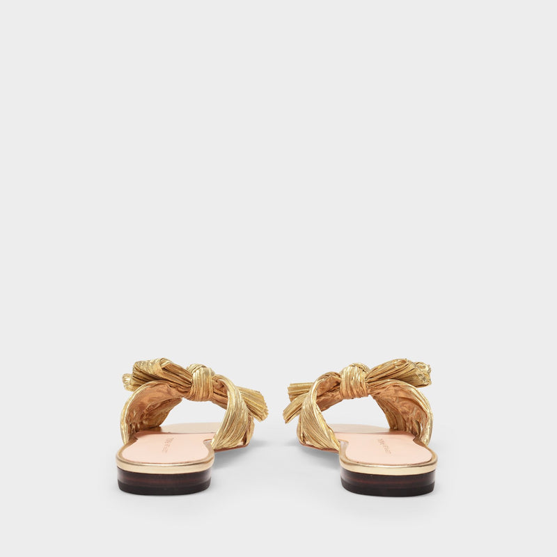 Daphne Knot Flat Sandals in Gold Fabric